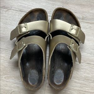 Gold Birkenstock Arizona Buckle Sandals